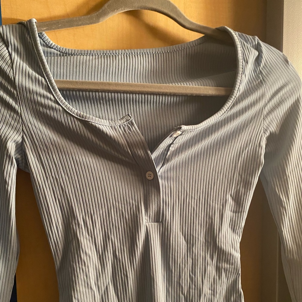 light blue long sleeve bodysuit